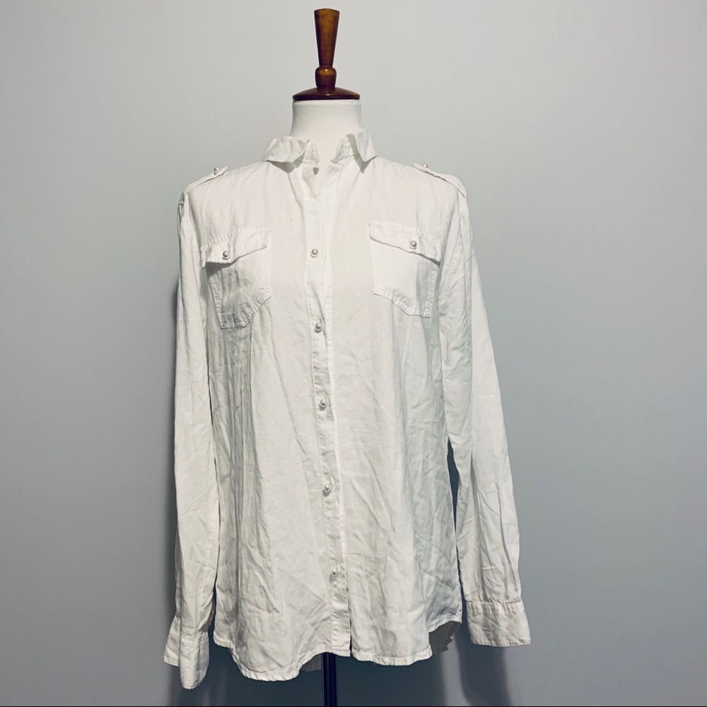 Francesca’s pearl button down shirt